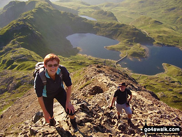 Climbing Crib Goch with Llyn Llydaw in the background