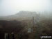 Mynydd Tarw summit cairn in mist