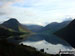 Yewbarrow (left), Great Gable (centre in cloud), Lingmell and the shoulder or Scafell Pike (right) from across Wast Water