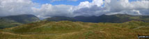 *Baystones (Wansfell) in the foreground with Red Screes (left), Stony Cove Pike (Caudale Moor), Thornthwaite Crag and the Froswick, Ill Bell, Yoke ridge silhouetted on the skyline from Wansfell Pike