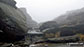 Sculptured rock streams on a misty Kinder Scout