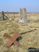 Discarded ironwork and trig point on Black Fell (Haresceugh Fell) summit