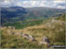 Looking down to Alcock Tarn from near Heron Pike with Helm Crag, Gibson Knott and Steel Fell beyond