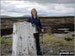 Standing beside the summit trig point on Firth Fell