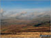 Clouds over the higher fells looking back towards Boot from Great Worm Crag