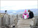 My little girl and her cousin watching the mountain bikers at the top of the Ski lift about half-way up Aonach Mor