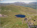 Llynnau Barlwyd (foreground), Moel Farlwyd (midground left), Yr Aran (pointed peak above Moel Farlwyd), Mount Snowdon (Yr Wyddfa) & Y Lliwedd from Moel Penamnen