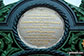 Medallion on the top of the ornate fountain in the centre of Aberfeldy