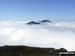 The summits of Ben Vane (left) and Beinn Ime poking up through the clouds during a temperature inversion seen from Ben Vorlich (The Arrochar Alps)