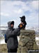 My partner Anthony and our lovely dog Cookie on top of Loughrigg Fell on a blustery Sunday