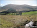 Newton Tors and Hare Law towering above Hethpool from White Hill (Hethpool)