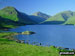 Wasdale Head featuring Yewbarrow (left), Great Gable (centre) and Lingmell (right) from across Wast Water