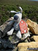 Soft toy on the large cairn near Ana Cross