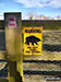 Warning sign on a fence in Little Bollington