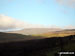 Cloud and snow on Cross Fell from The Pennine Way at Great Rundale Beck