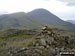 Brandreth summit cairn with Gillercomb Head leading up to Green Gable with Great Gable looking majestic in the background 