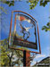 The Stagger Inn sign outside the Drovers Inn in Inverarnan