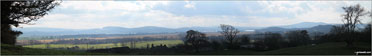 Looking South across Foulshaw Moss to Milnthorpe Sands,  Arnside Knott and The forest of Bowland from Buckhouse Wood above Mill Side