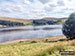 Yacht sailing on Errwood Reservoir in The Goyt Valley