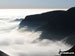 Cloud trapped by a temperature inversion clawing at the eastern slopes of Yoke, Ill Bell and Froswick as seen from Thornthwaite Crag