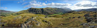 Blencathra or Saddleback (left), Clough Head, Fisher's Wife's Rake, Calfhow Pike, Great Dodd, Watson's Dodd, Stybarrow Dodd, Raise (Helvellyn) and Helvellyn in the centre with a glimpse of Thirlmere (right) from the summit of High Rigg