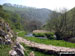 The River Dove in Beresford Dale with Wolfscote Hill above