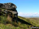 Rock formations at Knottend Well with Whernside on the horizon
