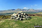 Top o' Selside summit cairn with the Coniston Fells: White Maiden, Walna Scar, Dow Crag, The Old Man of Coniston, Brim Fell, Swirl How and Wetherlam as a backdrop