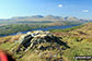 Low Light Haw (Top o' Selside) summit cairn with the Coniston Fells: White Maiden, Walna Scar, Dow Crag, The Old Man of Coniston, Brim Fell, Swirl How and Wetherlam in the background