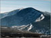 Blencathra (or Saddleback) (centre left distance) behind Atkinson Pike (centre right) with Sharp Edge prominent (mid left) from an unfamiliar viewpoint on Bowscale Fell