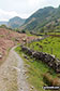 On the Cumbrian Way beside Stonethwaite Beck looking up Borrowdale to Alisongrass Crag and Eagle Crag