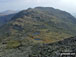 Three Tarns (or two tarns and a puddle) with Shelter Crags, Gunson Knott and Crinkle Crags beyond from Bow Fell (Bowfell)