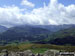 On the summit of Loughrigg Fell, looking towards Elterwater with the Langdale Pikes to the right