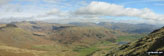 *Little Langdale with the Langdale Pikes, Helvellyn and Fairfield beyond from 
        Wetherlam